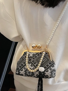 Vintage oriental style embroidery evening bag with pearl handle and long black tassel
