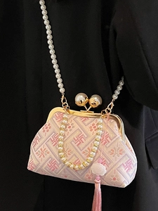 Elegant Chinese style pearl handle clutch bag with floral embroidery and pink tassel