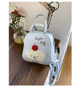 Détail du sac à dos bleu clair Apple Dog avec imprimé dessin animé et sangle réglable