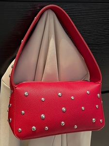 Red lychee grain leather shoulder bag with silver rivet studs and stylish wide strap