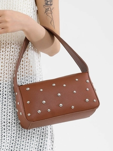 Vintage brown leather shoulder bag with silver rivets and trendy rectangular shape