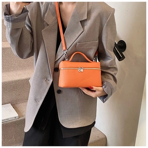 Bolso bandolera de moda naranja brillante con textura litchi y asa para mujer