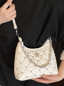 Quilted cream crossbody bag with silver star emblem and metal chain strap for women