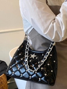 Quilted black chain bag with sparkling rhinestones and star detail for elegant summer style
