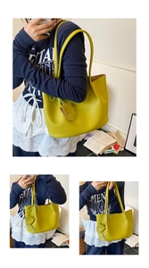 Detail of lemon yellow lychee texture tote bag with matching small accessory pouch
