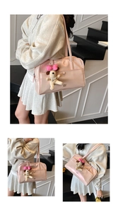 Pink glossy leather Boston bag with plush puppy pendant shown from multiple angles