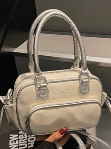 Modern white and silver bowling handbag with adjustable strap for urban daily fashion