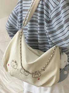 Chic beige large capacity shoulder bag with cartoon bear print and metal chain strap