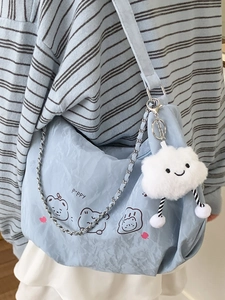 Light blue minimalist shoulder bag with cartoon puppy print and cloud plush pendant