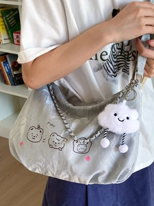 Light gray wrinkled texture shoulder bag with bear print and plush cloud charm
