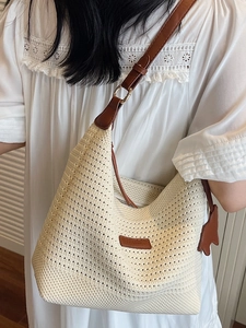 Summer woven tote bag in cream white with brown leather straps and crochet texture