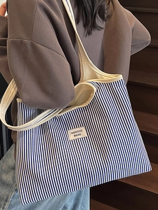 Minimalist blue and white striped canvas tote bag with large capacity for women