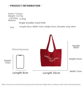Detailed view of red canvas tote bag showing dimensions 36x15x32cm and material texture