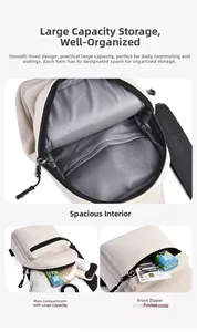 Detail view of large beige canvas chest bag with internal compartments and zipper pocket