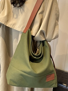 Olive green large capacity canvas hobo bag with contrast brown shoulder strap for women