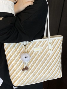 Striped woven tote bag for women with leather straps and a cute plush cartoon pendant