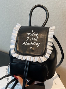 Mini zaino in pelle PU nera con bordo a volant bianco e ricamo per donne alla moda