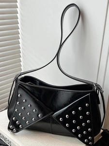 Retro black faux leather shoulder bag with silver studs and triangle flap design