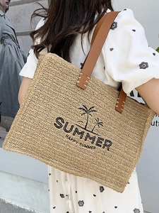 Woven straw tote bag with brown leather straps and Summer palm tree embroidery