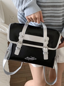 Grand sac cabas 2025 élégant en noir et argent avec un design à double boucle chic