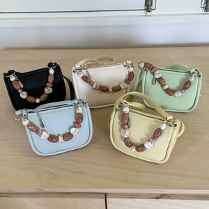 Mini beaded handle crossbody bags in five colors with litchi grain faux leather texture
