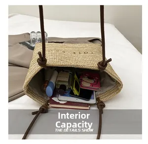 Top view of woven tote bag interior showing capacity for phone, wallet and cosmetics