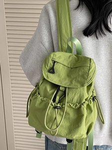 Minimalist grass green nylon backpack with drawstring for students and outdoor travel