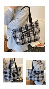 Detailed views of checkered canvas tote bag with metal chains and leather zip pockets