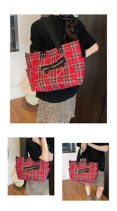 Detail view of the red plaid gothic punk tote bag with silver chains and metal rivets