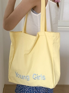 Minimalist yellow canvas tote bag with Young Girls letter embroidery for casual daily wear