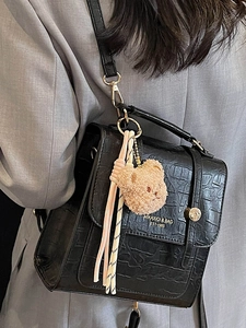 Retro black faux crocodile skin crossbody bag with cute teddy bear and woven charms