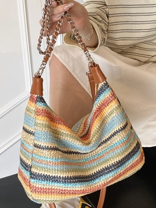 Colorful woven hobo shoulder bag with striped pattern and metal chain strap for women