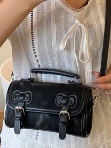 Sac à dos tendance en similicuir noir pour femme avec nœuds 3D et bandoulières amovibles