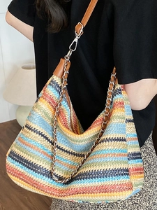 Colorful striped woven shoulder bag with chain strap and bohemian summer knit design