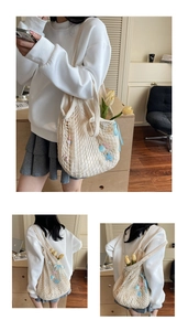 Detail of beige woven mesh tote bag featuring starfish charms and a light blue ribbon