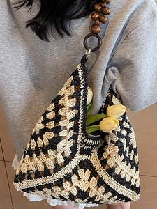 Fashionable woven tote bag with geometric patterns and wooden bead shoulder straps