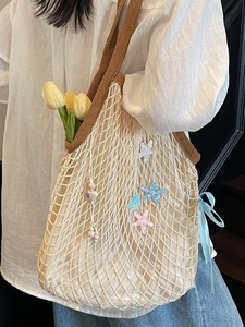 Beige hollow woven mesh tote bag with starfish charms and brown wide strap for summer beach