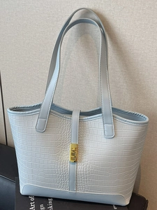 Minimalist light blue faux crocodile tote bag with gold lock and double shoulder straps
