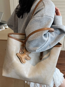 Large beige tote bag with crocodile pattern and brown contrast trim for women