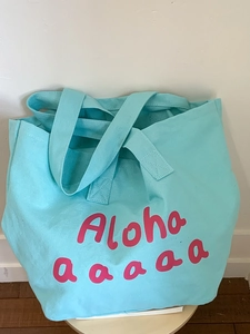 Large light blue canvas tote bag with pink Aloha text for summer beach vacation and commute