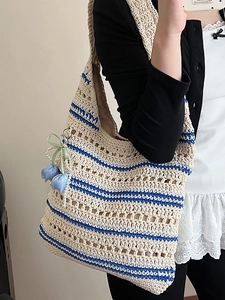 Crochet hobo tote bag with blue stripes and floral pearl charm for summer fashion