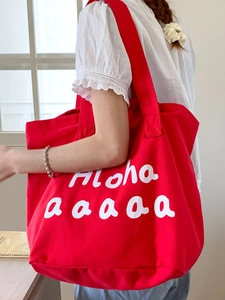 Large red canvas tote bag with white Aloha print for summer vacation and daily commute
