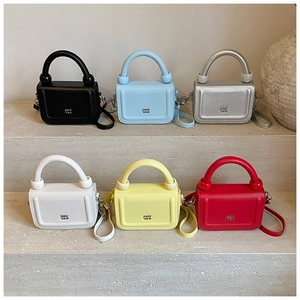 Detailed collection of mini litchi leather handbags in six vibrant colors with chain detail