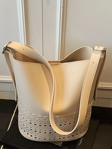 Women Fashion Laser Cutout Bucket Bag PU Leather Large Capacity Shoulder Crossbody Bag Minimalist Wave Edge Solid Color Bag