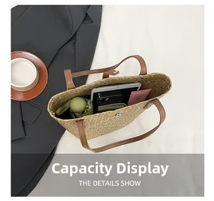 Detailed interior of a straw tote bag showing capacity for tablets and essentials