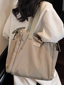 Minimalist high-capacity canvas tote bag in khaki and green for casual summer fashion