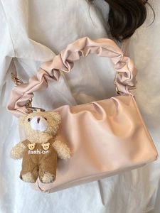 Pink pleated cloud shoulder bag with cute teddy bear charm and gold chain strap