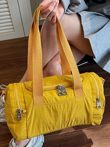 Stylish bright yellow large capacity fitness bag with reinforced woven handles and metal zippers