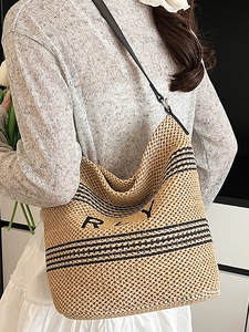 Grand sac cabas en paille beige à rayures noires et logo RAY pour mode d'été