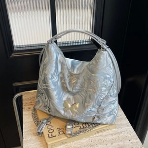 Silver metallic ripple Hobo bag with gold butterfly clasp and chain shoulder strap